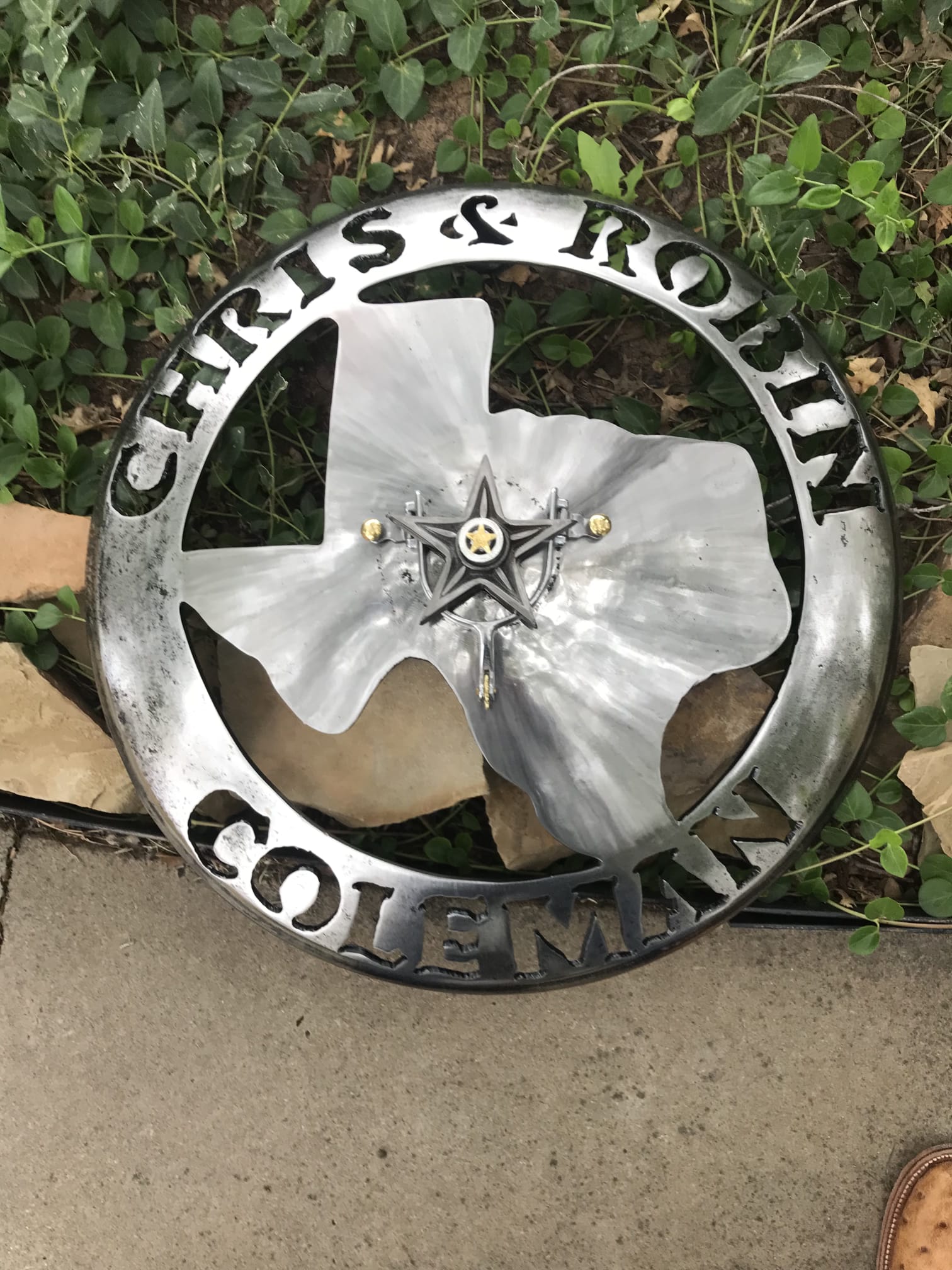 Metal sign with personalized designs.